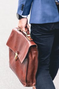 man carrying a briefcase